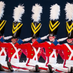 A group of men in red and white uniforms.